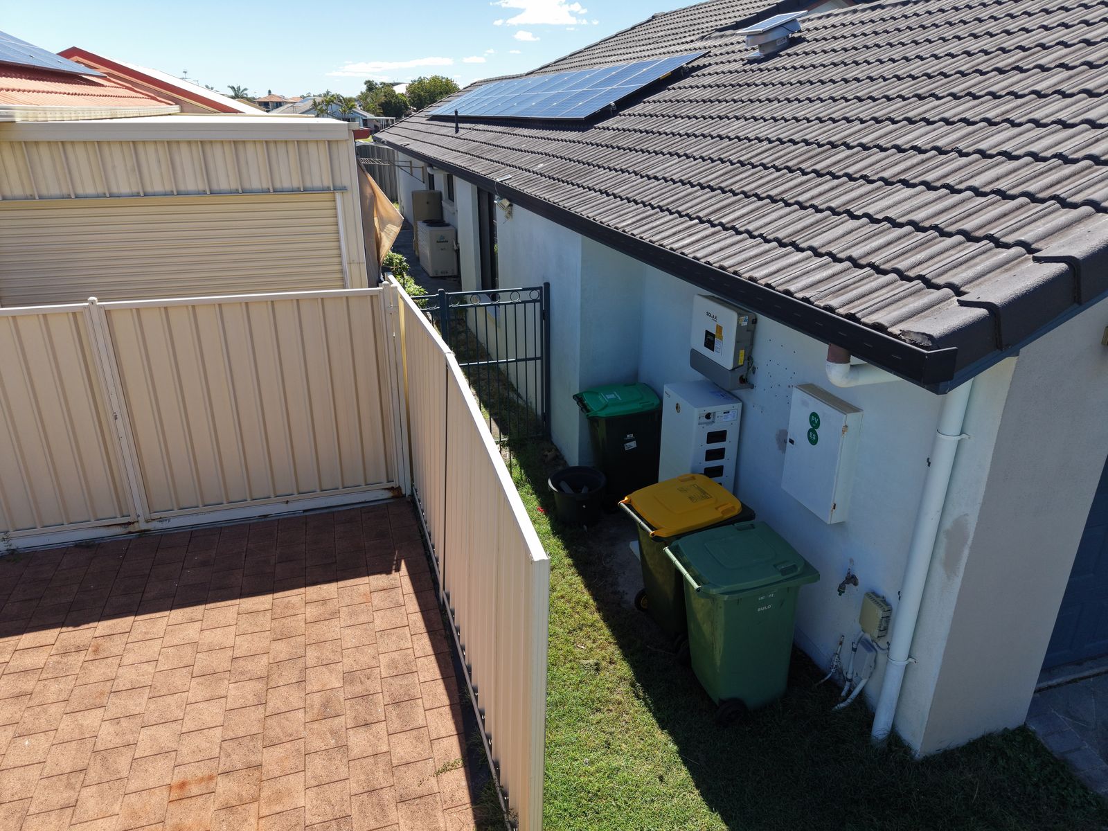 Solar panel array on rooftop Pelican Waters